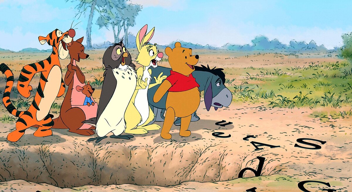 Die Winnie Puuh Charaktere schauen erfreut zur Seite.