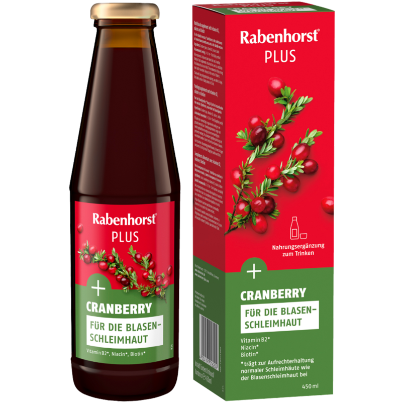 Rabenhorst-Cranberrysaft Cranberry Plus in brauner Flasche vor farblich passender Verpackung mit Abbildung von frischen Cranberries und grünen Zweigen. | © Rabenhorst