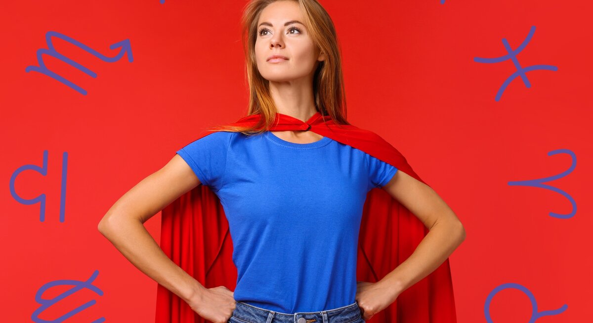 Eine Frau in einem blauen T-Shirt und rotem Umhang steht in einer kraftvollen Superhelden-Pose vor einem roten Hintergrund. Sie schaut entschlossen in die Ferne. Um sie herum schweben Symbole der Tierkreiszeichen, was eine Verbindung zwischen Stärke, Selbstbewusstsein und astrologischen Eigenschaften andeutet. Die Szene vermittelt ein Gefühl von Macht, Unabhängigkeit und Selbstvertrauen.