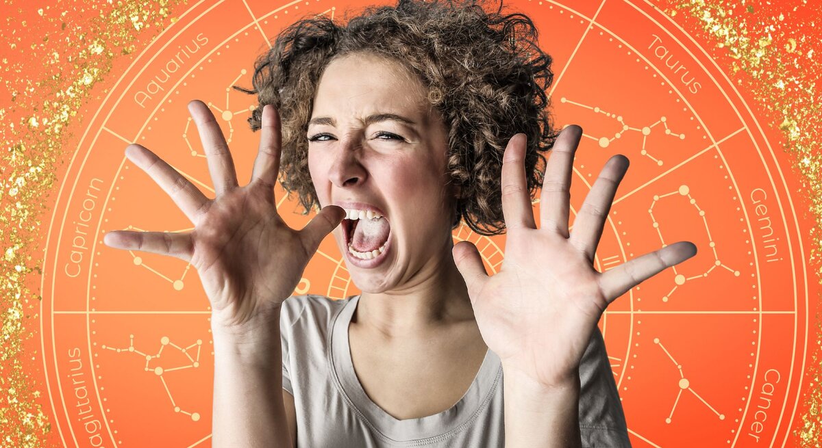 Eine junge Frau mit lockigem Haar hebt erschrocken beide Hände und schreit. Im Hintergrund befindet sich ein orangeroter astrologischer Kreis mit den Symbolen und Konstellationen der zwölf Tierkreiszeichen, verziert mit goldenen Glitzereffekten."