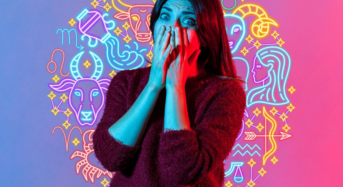Eine Frau mit langen Haaren hält ihre Hände vor ihr Gesicht und schaut überrascht oder erschrocken. Sie trägt einen dunkelroten Pullover. Der Hintergrund ist in leuchtenden Blau- und Pinktönen gehalten und zeigt neonartige Symbole der zwölf Sternzeichen.
