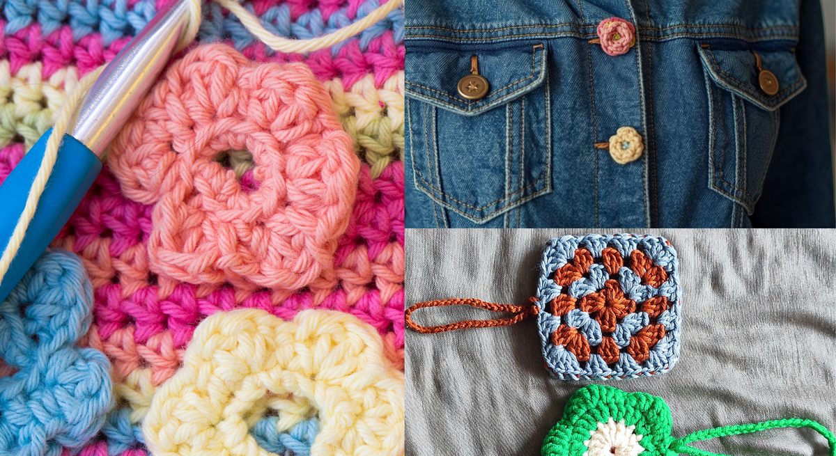 Nahaufnahme einer blauen Jeansjacke mit rosa gehäkelten Blumenverzierungen, getragen über einem beigen Pullover, im warmen Innenraum.