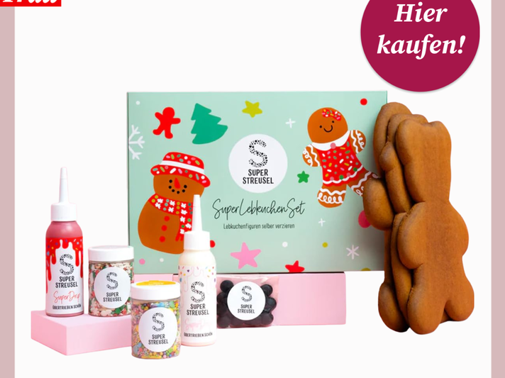 Lebkuchen-Set mit buntem Zuckerdekor, Streuseln und Figuren zum Verzieren vor fröhlich gestalteter Geschenkbox. | © Canva/Super Streusel/Collage:bildderfrau.de
