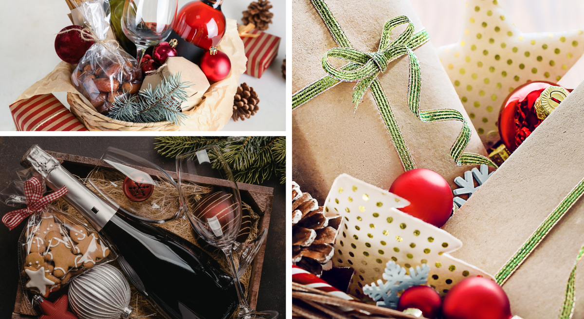 Drei weihnachtlich dekorierte Geschenkkörbe mit Wein, Gläsern, Gebäck, Tannenzweigen und roten Kugeln in Nahaufnahme.