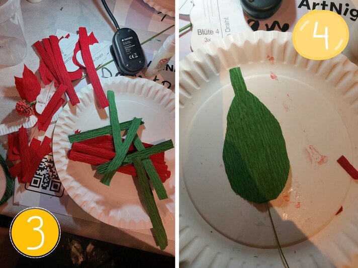 Grünes und rotes Krepppapier in Streifen auf einem weißen Pappteller verteilt, daneben Bastelutensilien wie Kleber und eine halbfertige Blüte. | © Linda Pötzsch