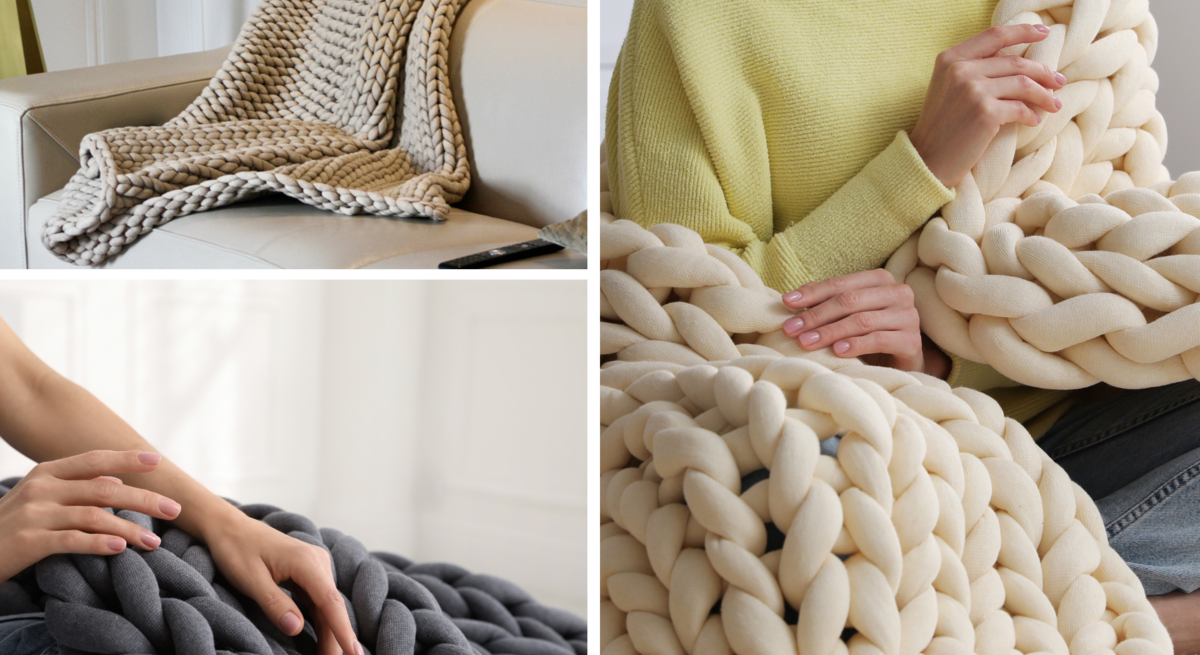 Eine Frau im gelben Pullover hält eine cremefarbene Chunky-Decke aus grober Wolle, sitzt gemütlich auf dem Boden.