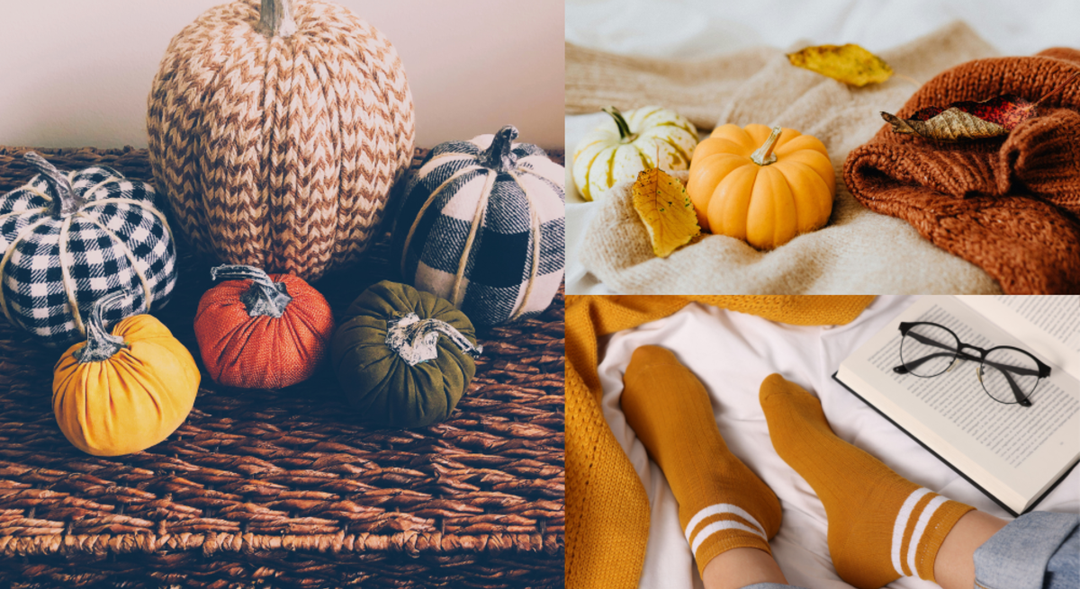 Herbstliche Kürbisse aus Socken, warme Decken, bunte Blätter und Füße in ockerfarbenen Socken neben Buch und Brille auf Bett.