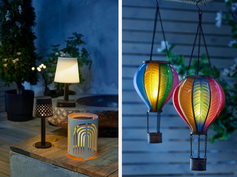 Stimmungsvolle Gartenbeleuchtung mit leuchtenden Tischlampen und bunten Heißluftballon-Laternen in blauer Abendstimmung. | © Woolworth/Canva/Collage:bildderfrau.de