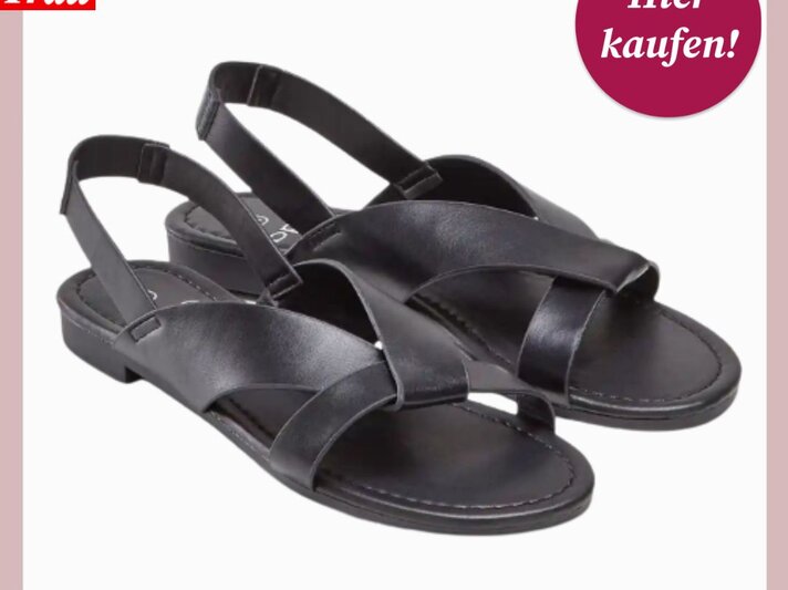 Schwarze Sandalen mit elegant überkreuzten Riemen und flacher Sohle vor weißem Hintergrund, betont durch den Hinweis "Hier kaufen!". | © Collage: bildderfrau.de; Canva