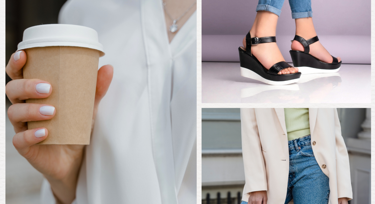 Junge Frau in weißer Wickelbluse hält Pappbecher Kaffee, trägt dezenten Nagellack und silberne Kette mit Anhänger.