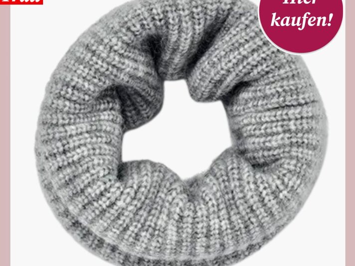 Kuscheliger, grauer Strickschal in Schlauchform mit grobem Rippmuster, ideal für kalte Wintertage. | © Tchibo