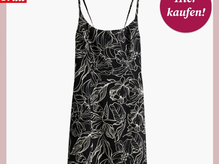 Elegantes schwarzes Sommerkleid mit feinem weißem Blumenmuster, beworben von "Bild der Frau". | © H&M
