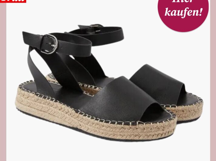 Modische schwarze Sandalen mit verstellbarem Knöchelriemen und Bastsohle vor weißem Hintergrund. | © C&A