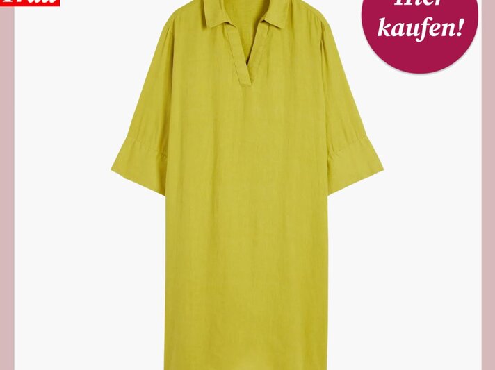 Das Bild zeigt ein grünes Kleid mit einem entspannten Schnitt, Kragen und V-Ausschnitt. Das Kleidungsstück hat halblange Ärmel und fällt bis etwa zum Knie. Es ist auf einem einfarbigen, pastellrosa Hintergrund präsentiert, was den lebendigen Farbton des Kleides betont. In der oberen linken Ecke ist das Logo "Bild der Frau" in Weiß auf einem roten Hintergrund zu sehen, und oben rechts befindet sich ein rundes, bordeauxrotes Etikett mit der Aufschrift "Hier kaufen!" in weißer Schrift. | © C&A