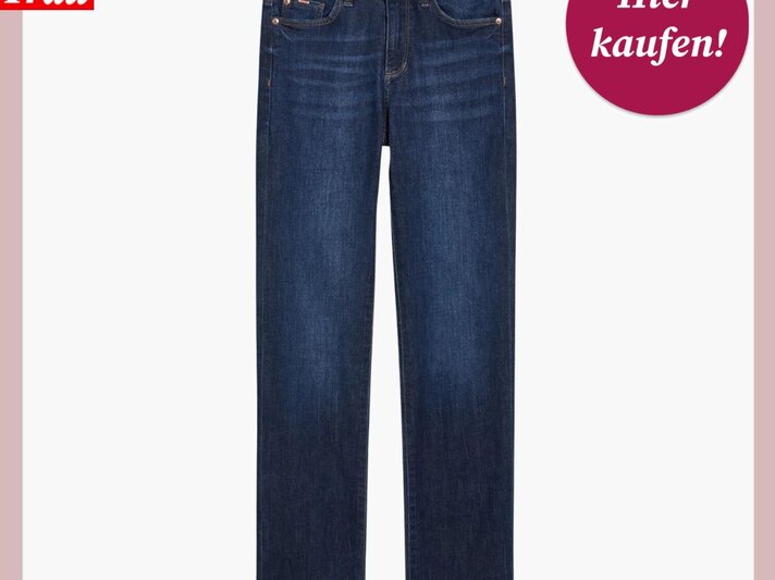Das Bild zeigt eine gerade geschnittene Jeans in dunkler Waschung auf einem einfarbigen Hintergrund. Die Hose ist so platziert, dass der vordere Teil mit sichtbaren Nähten, Gürtelschlaufen und einem Knopf am Bund zu sehen ist. Oben links im Bild ist das Logo "Bild der Frau" in Weiß auf einem roten Hintergrund. In der oberen rechten Ecke des Bildes befindet sich ein kreisförmiges, bordeauxrotes Etikett mit der weißen Aufschrift "Hier kaufen!". | © C&A